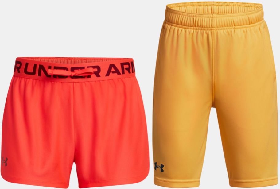 girls and boys UA shorts stock images