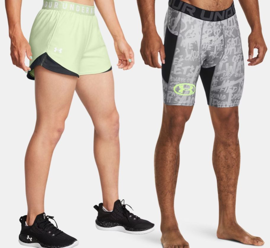 male and female models wearing Under Armour training shorts