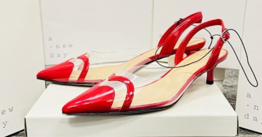 a pair of women's 2 inch high heel shoes in red and clear sitting on a white shoe box with more white shoe <a href='https://sjf.a8c.myftpupload.com/product/crown-signature-collection' target='_blank' rel='follow'>boxes</a> behind it” width=”912″ height=”479″></p>
<p>Through February 17th, hurry on over to <a href=