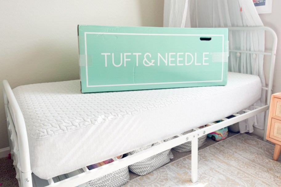 tuft and needle <a href='https://sjf.a8c.myftpupload.com/product/sisters-in-style-collection' target='_blank' rel='follow'>box</a> on mattress” width=”912″ height=”608″></p>
<p>Overall, if you’re feeling overwhelmed by the mattress market, Tuft & Needle is the no-frills, responsibly crafted, ideally comfy bed for a variety of shapes and sizes. You just can’t go wrong!</p>
<div class=