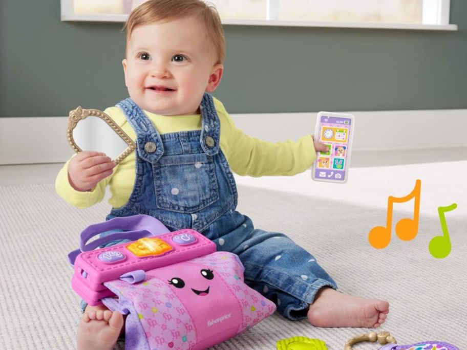 baby playing with Fisher-Price Laugh & Learn Purse