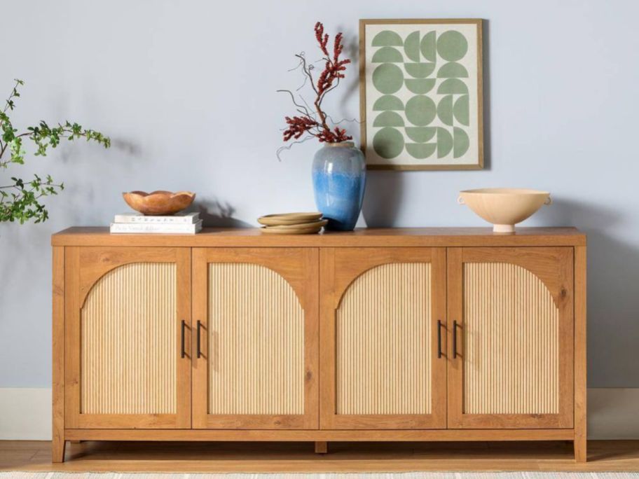 Welwick Designs Reeded Sideboard w/ Arched Doors against wall