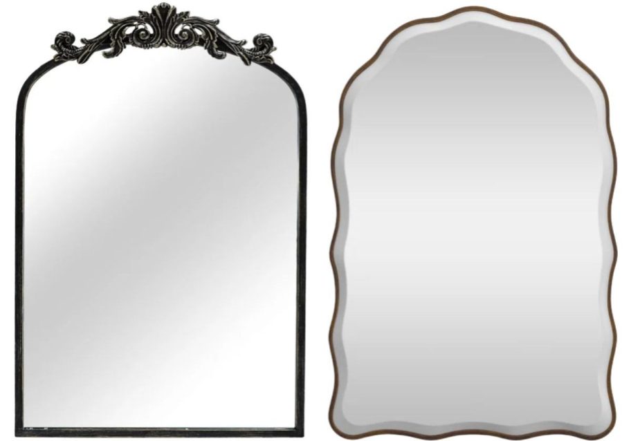 two arched wall mirrors stock images