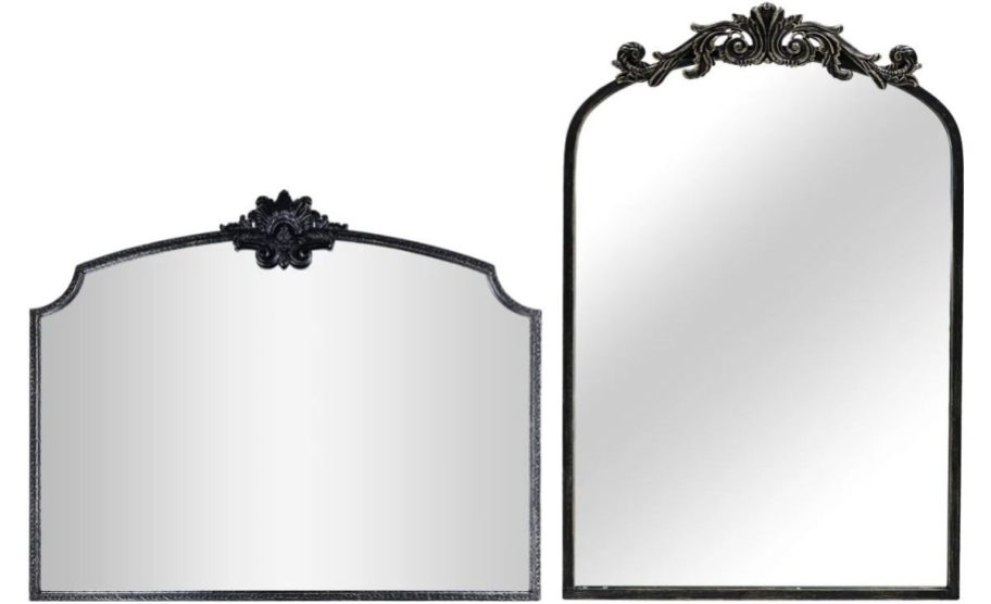 a wall mirror ahown with a mantle mirror stock images