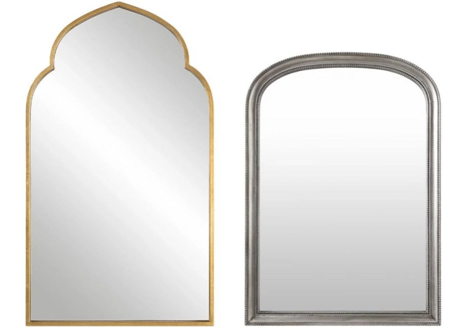 two arched wall mirrors stock images