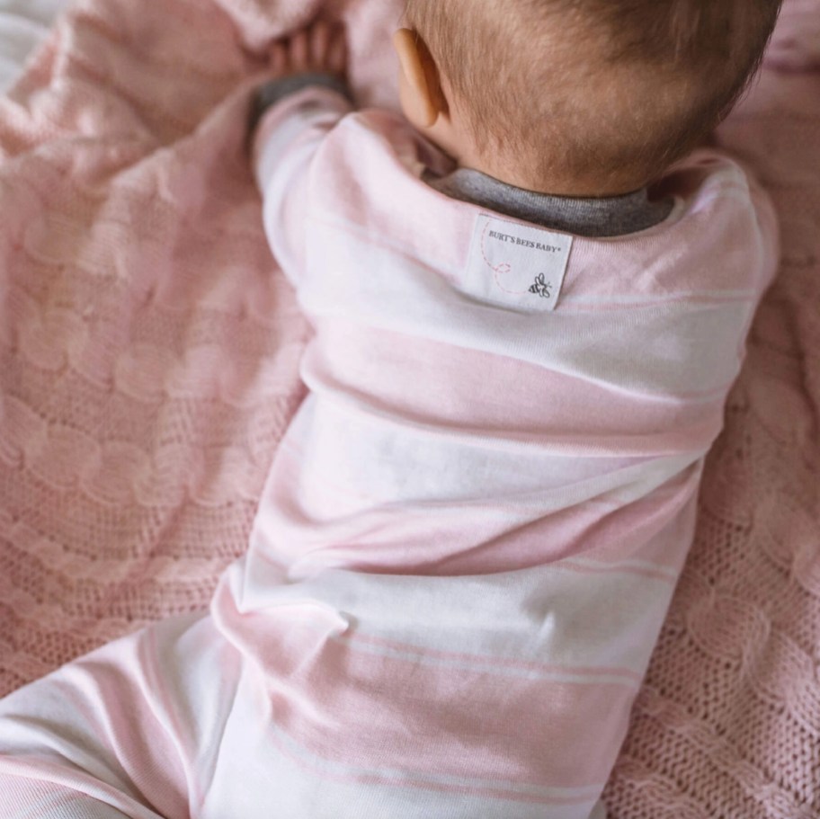 baby in pink stripe sleeper