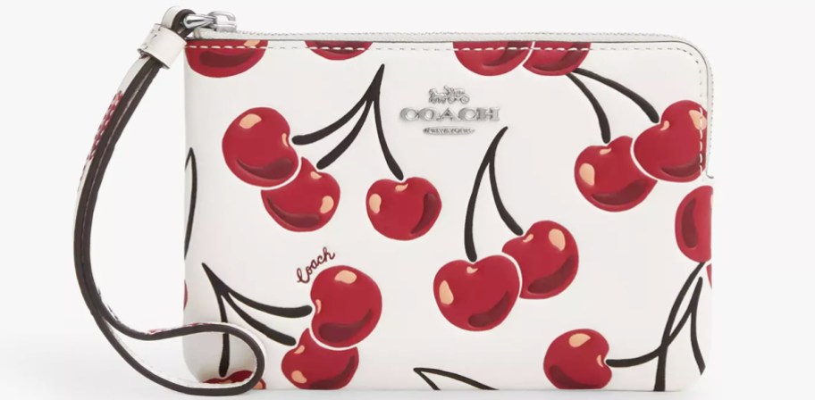 white coach wristlet with cherries print