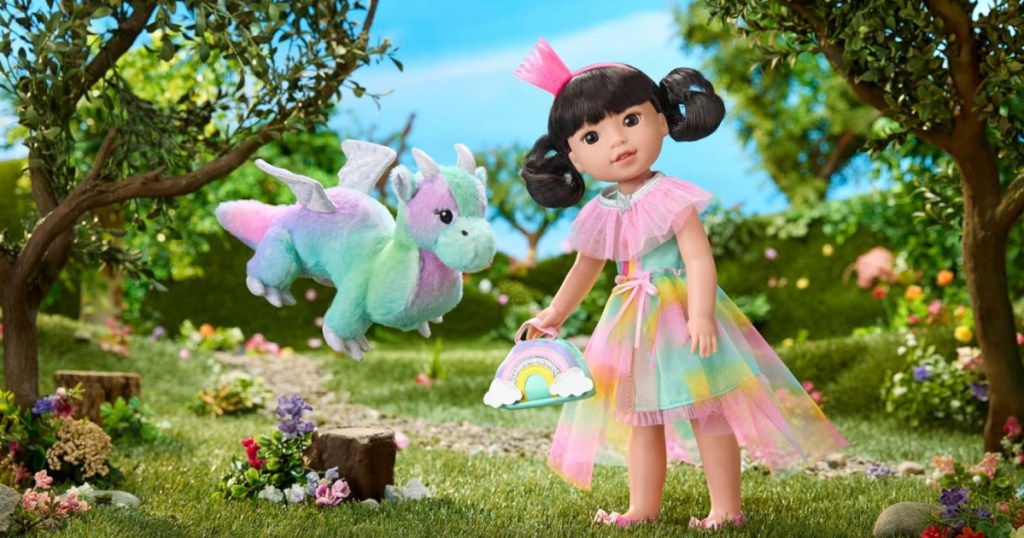 American girl, doll, dressed in pastel colored tutu next to flying dragon