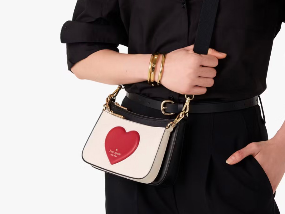 white and black heart purse