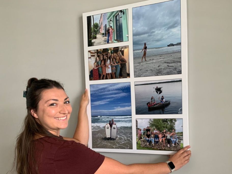 Woman hanging a Canvas Champ Photo Collage on a Wall