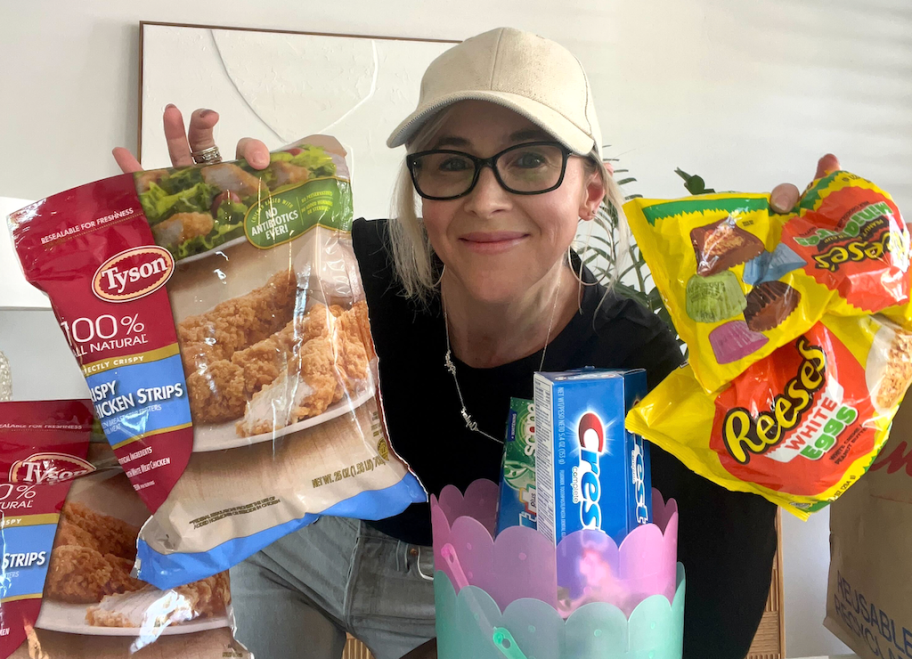 woman holding a bag of chicken and Easter candy