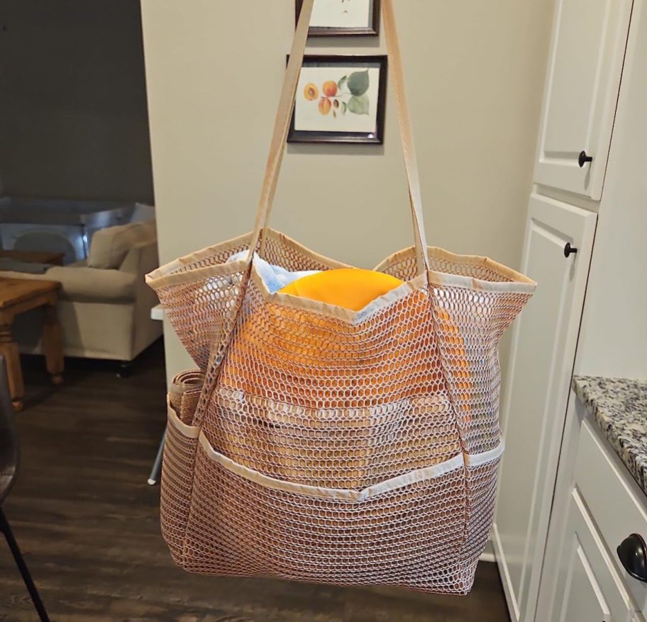 mesh beach tote <a href='https://tootightdu.com/product/premium-wig-storage-bag-pillowcases' target='_blank' rel='follow'>bag</a> with towel and frisbee inside” width=”912″ height=”878″></p>
<p>A mesh beach tote is a travel essential, keeping sand out while providing breathable storage for beach gear or even dirty laundry. Lightweight and spacious, this is one of the best travel accessories perfect for any trip.</p>
<hr>
<h2><strong>30. Kick back and learn some common phrases to make you seem like a seasoned traveler. </strong></h2>
<p><a href=