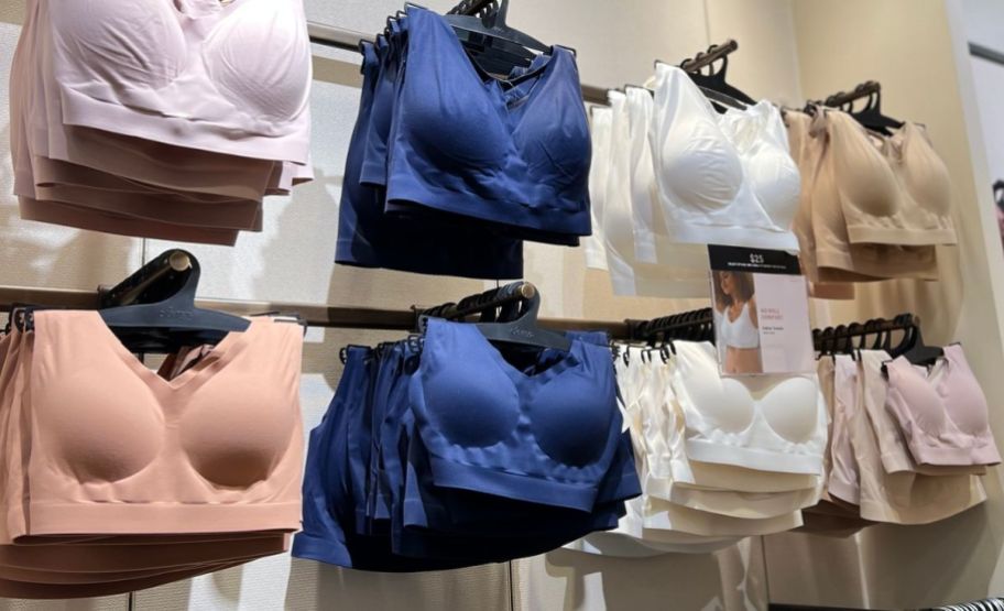 multicolored bras hanging in soma store 