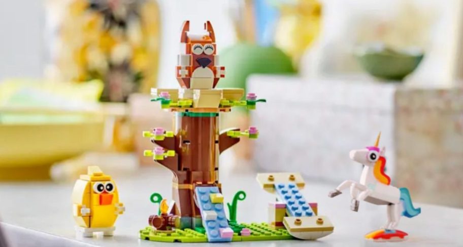 3 lego animals shown with a lego tree.