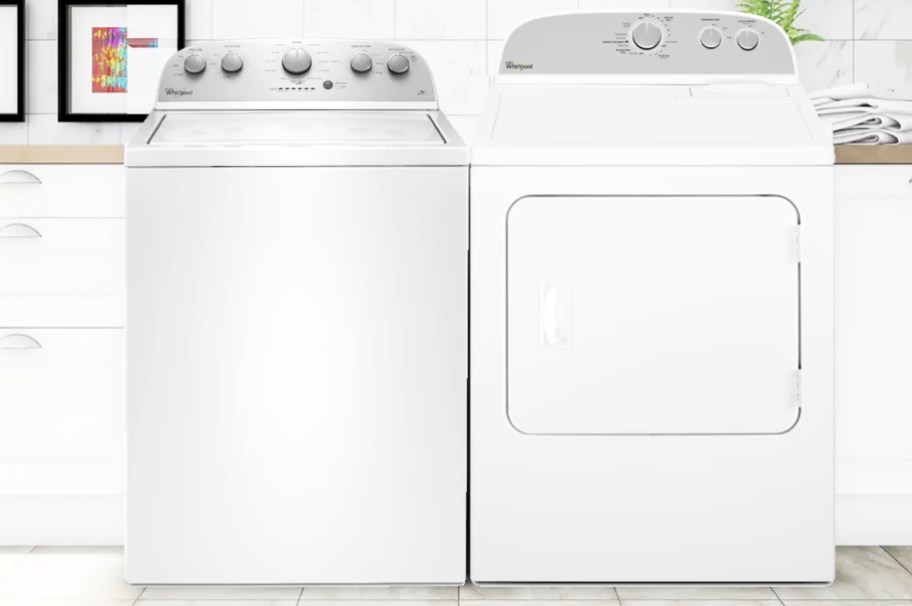 white Whirlpool washer and dryer set in laundry room