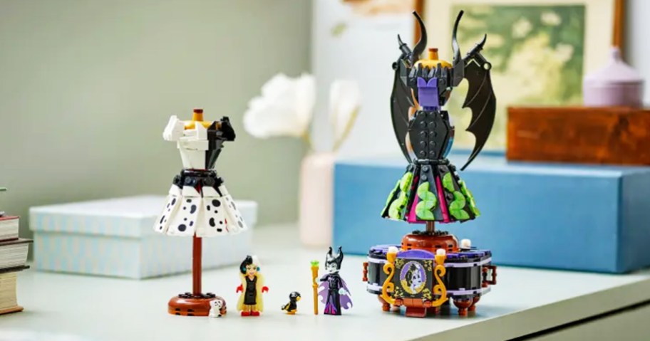 LEGO Disney Maleficent's and Cruella De Vil's Dresses on display