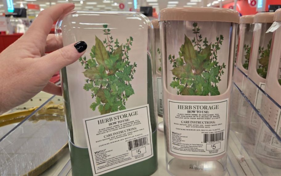 a womans hand holding an herb <a href='https://tootightdu.com/product/premium-wig-storage-bag-pillowcases' target='_blank' rel='follow'>storage</a> container” width=”912″ height=”570″></p>
<div class=