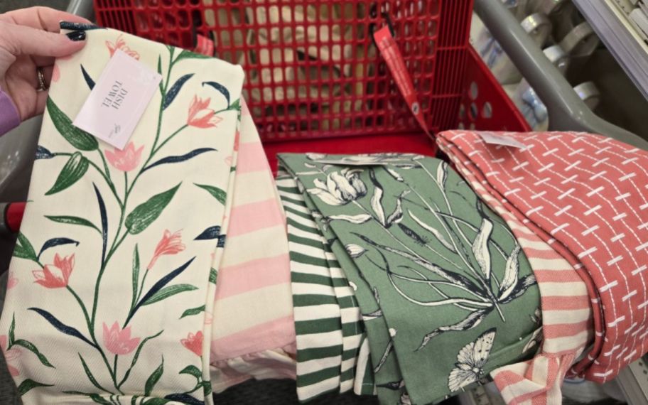 assorted dish towel sets displayed on a target cart