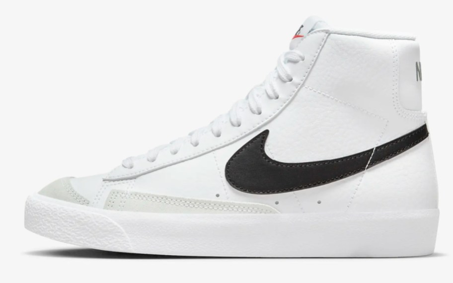 white high top shoes with black swoosh sign