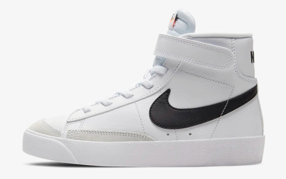 white high top shoes with black swoosh and velcro