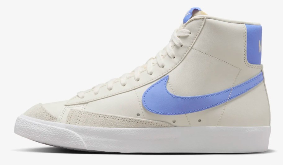 white high top sneakers with light blue swoosh sign