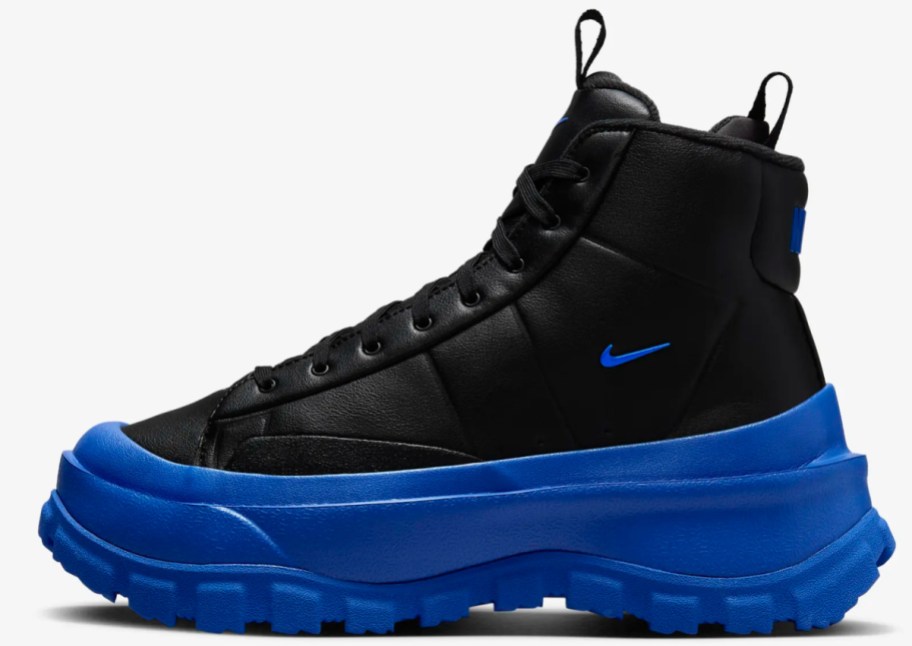 black high top sneakers with blue lug sole