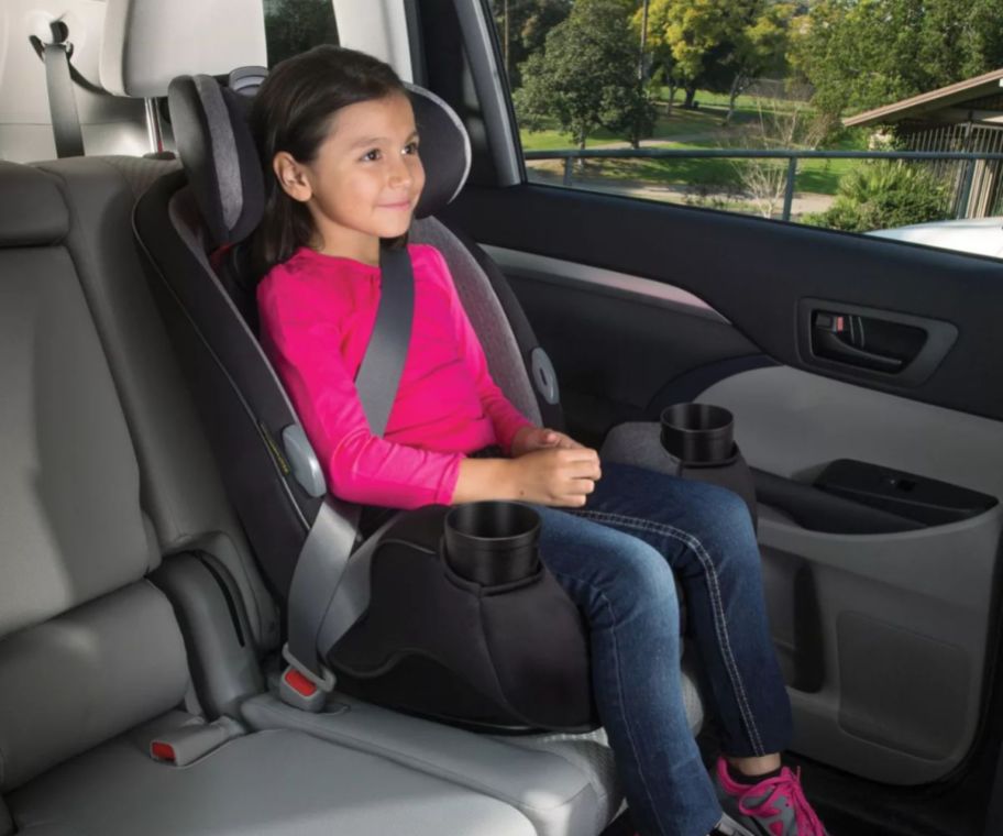 A child sitting in a car seat