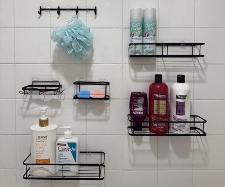 shower caddy shelves hanging on shower wall with toiletries 