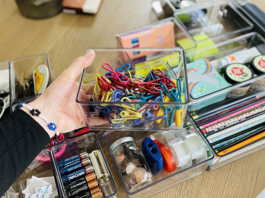 walmart the home edit office drawer organizer 6 piece set filled with office supplies on table with one piece being held by hand