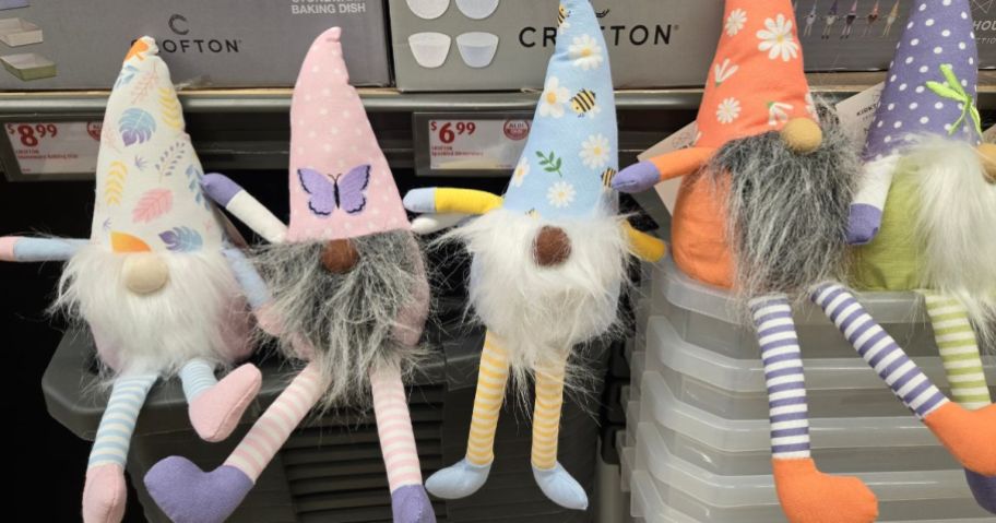 Five cute Aldi Mini Spring Gnomes hanging out in the Aldi aisle