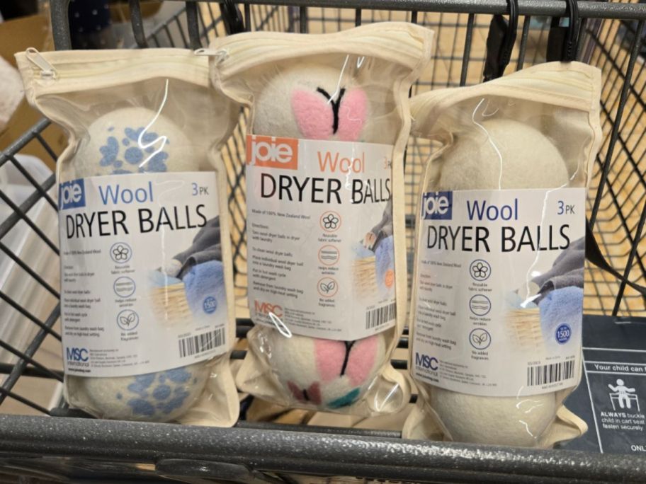 three Aldi Joie Wool Dryer Ball bags in a cart