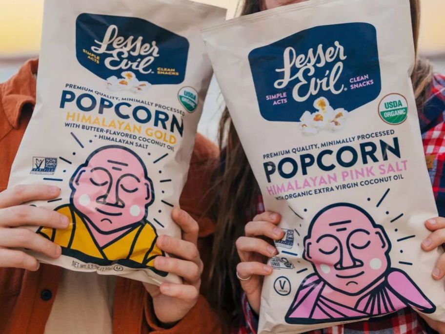 two <a href='https://online-shopping.fun/ultimate-trend-guide-spot-the-next-big-thing' target='_blank' rel='follow'>people</a> holding LesserEvil popcorn bags” width=”912″ height=”684″></p>
<p>Through March 15th, <a href=