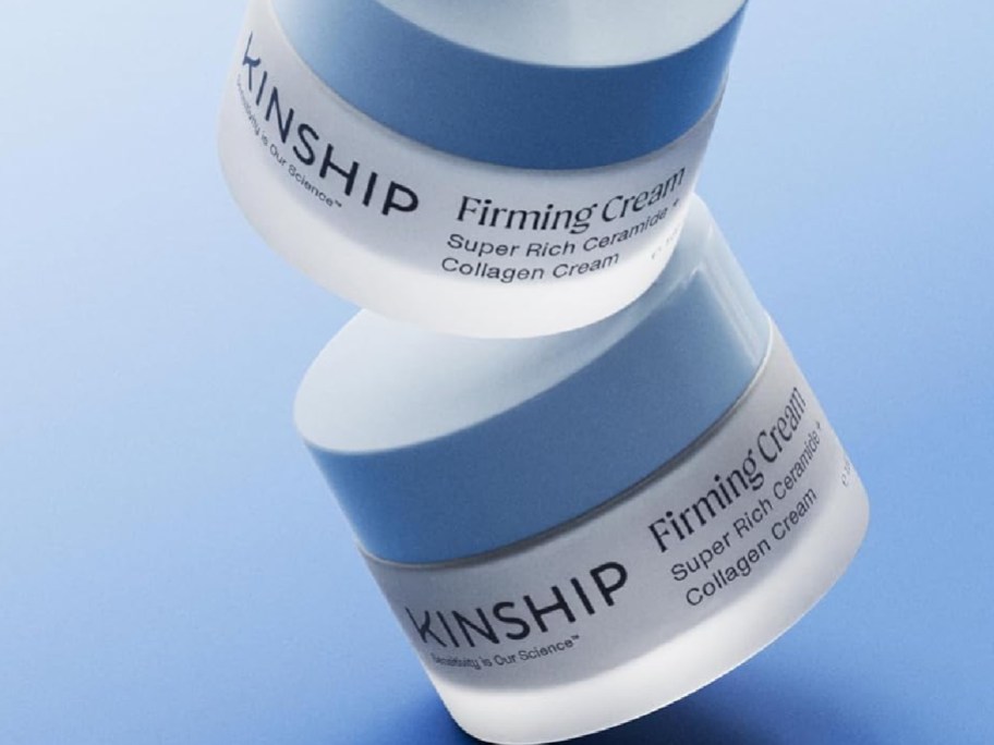 two Kinship Super Rich Ceramide + Collagen Firming Creams displayed with a blue background