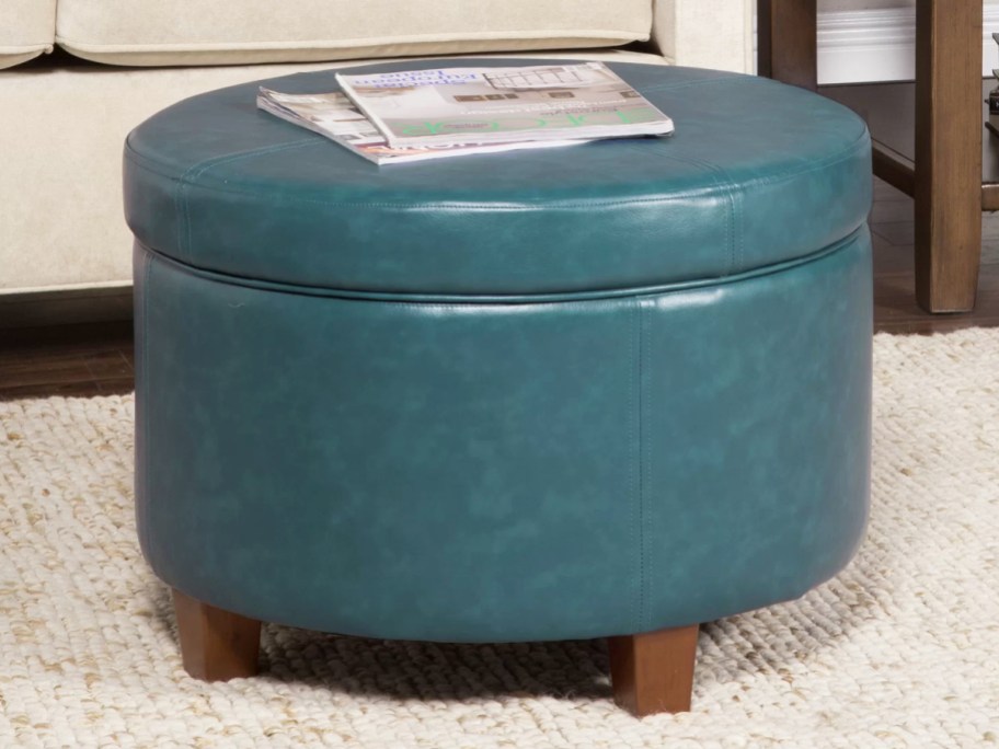 round blue faux leather ottoman