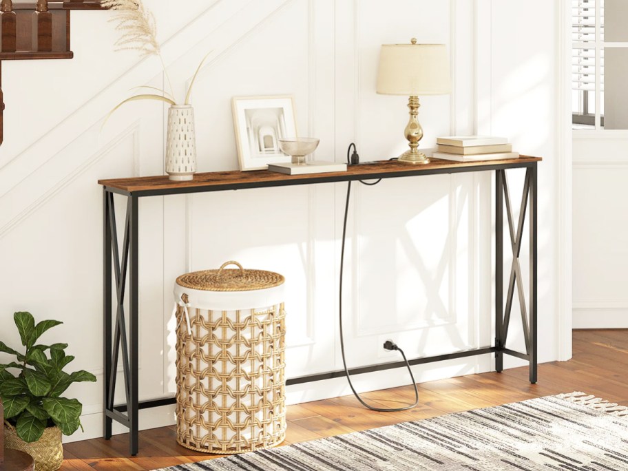 decorated console table in entryway