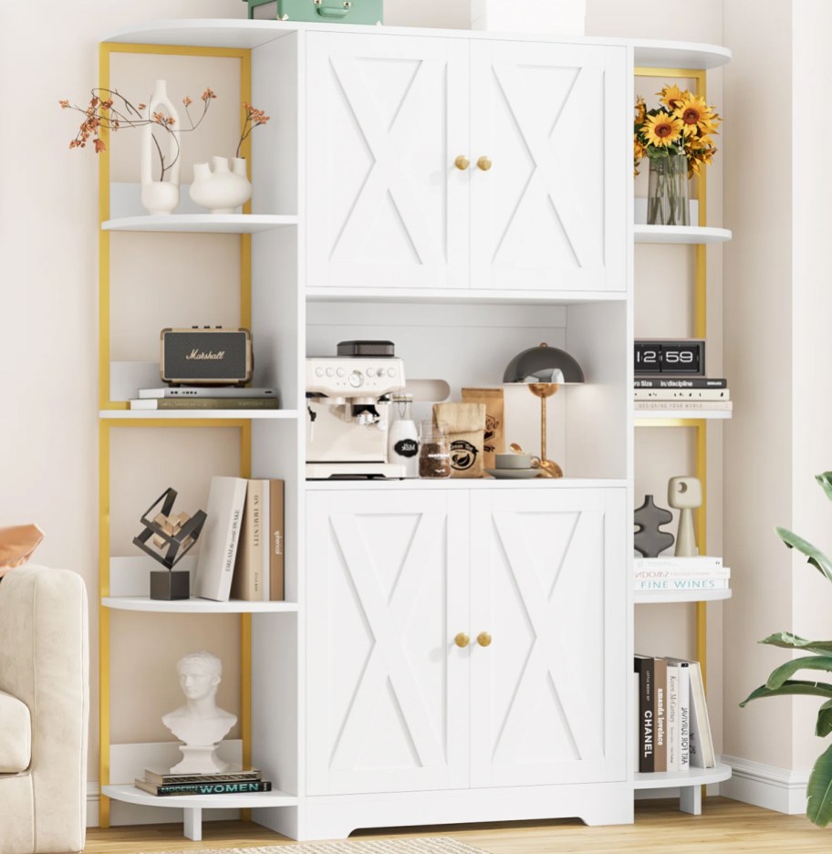 white kitchen storage cabinet with shelves on either side