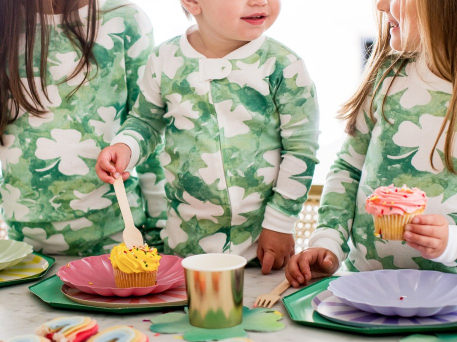 Children wearing saint patricks day pajamas