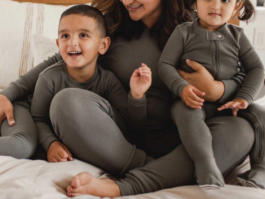 mom and two kids in waffle thermal pajamas