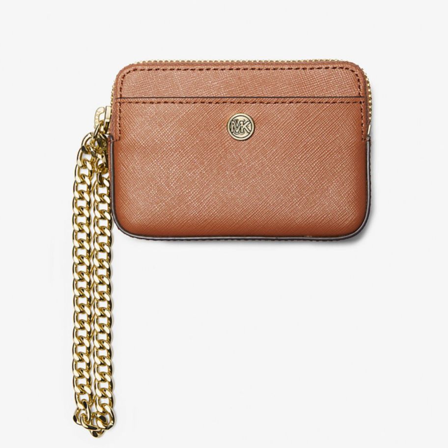 a small tan card case with chain