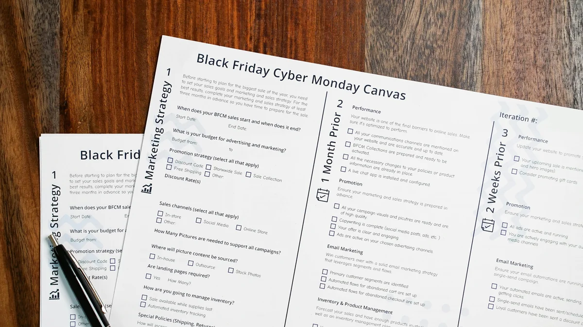 two black friday cyber monday games sitting on top of a wooden table - black friday leaked ad scans and coupon codes