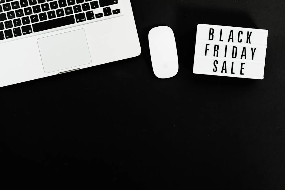 Black Friday sale sign with a laptop and mouse on a black background. Perfect for online shopping promotions. - cyber monday early access deals for subscribers