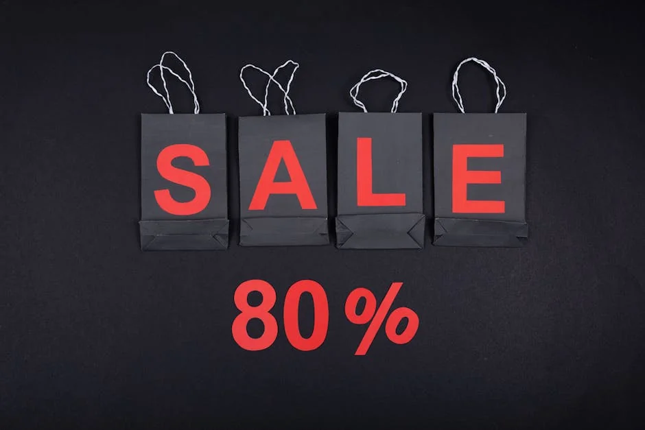 Highlighting a sale with 80% discount using black shopping bags and bold red text. - ecofriendly brand discounts and sustainable deals