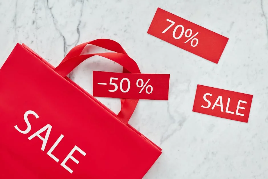 Red shopping bag and discount cards with percentages for promotional sale. - ecofriendly brand discounts and sustainable deals