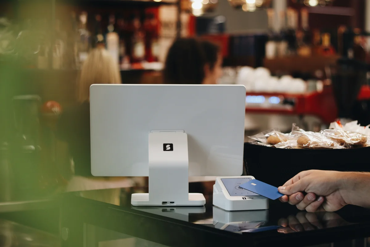 The SumUp POS Lite is designed to sit on a busy coffee shop or restaurant countertop, offering a simple and functional solution for handling transactions seamlessly with its modern design. - exclusive software license discounts for small businesses
