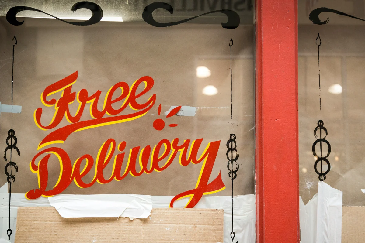 Free Delivery glass window signage - how to get free shipping on international orders