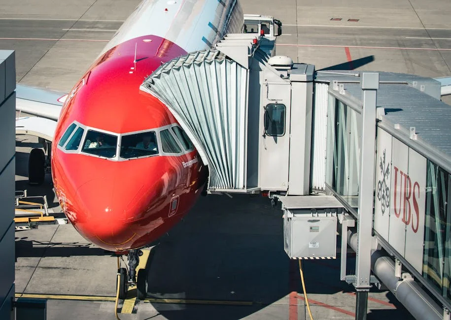 Airplane connected to jet bridge at Zurich Airport, Switzerland, ready for passengers. - airplane travel airport - Last minute flight deals and hotel voucher codes