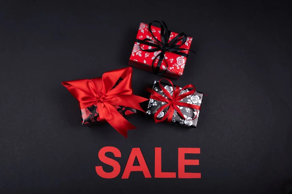 Stylish gift boxes with red ribbons on sale. Perfect for promotions and festive occasions. - photo printing coupons and personalized gift deals