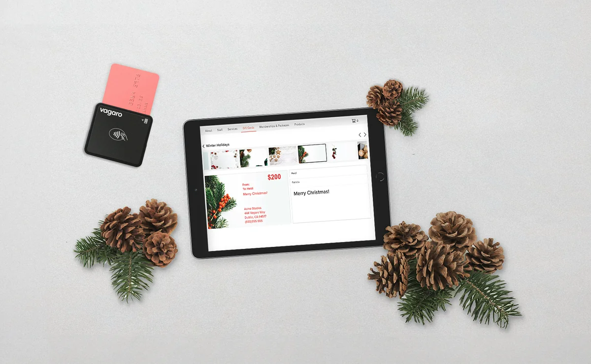 a tablet computer sitting on top of a table next to pine cones - redeemable gift card codes for online retailers