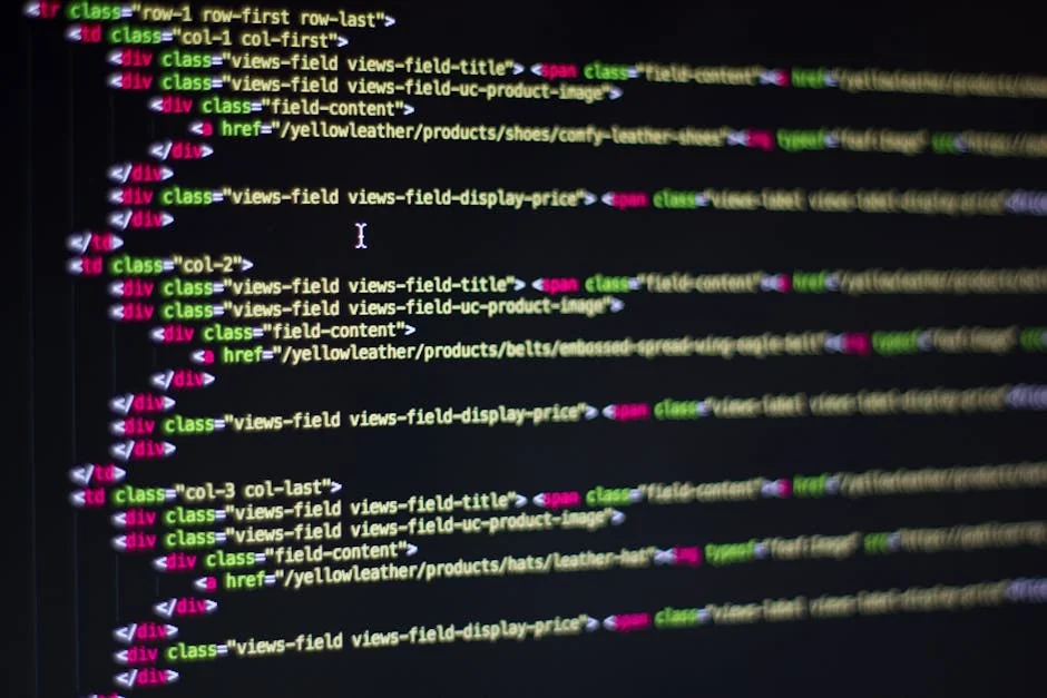 Detailed close-up of HTML code on a computer monitor, showcasing web development. - web design development - Reliable website for holiday gift guide deals